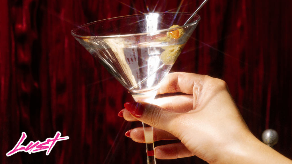 Woman holding a dirty martini